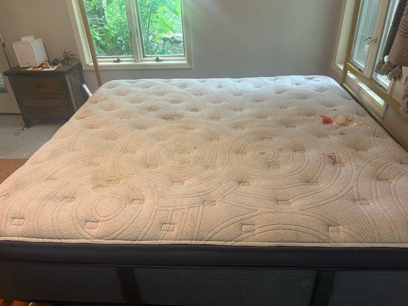Stained mattress quilting and seams, seen from the side